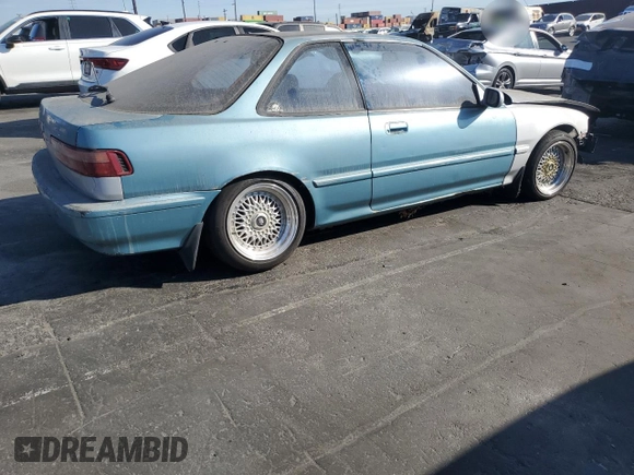 1990 Acura Integra with VIN JH4DA9358LS053319, listed as a Copart auction lot 80949884 with 42,570 mi miles and Salvage title. Bid and sale history available at DreamBid. Image 3.