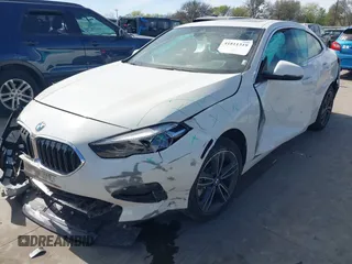 2024 BMW 2 Series 228i with VIN WBA53AK04R7N51291, listed as a IAAI auction lot 41811319 with 19,827 mi miles and . Bid and sale history available at carsss.com. Image 2.