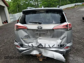 2018 Toyota RAV4 XLE with VIN JTMRFREV2JJ200677, listed as a Copart auction lot 59660535 with 82,283 mi miles and Salvage title. Bid and sale history available at DreamBid. Image 6.