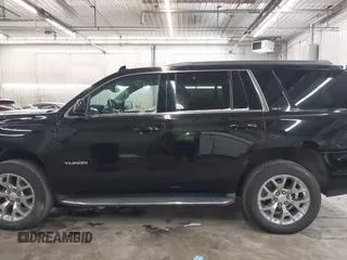 2016 GMC Yukon SLT with VIN 1GKS2BKC9GR176948, listed as a IAAI auction lot 41361221 with 125,178 mi miles. Bid and sale history available at carsss.com. Image 15.