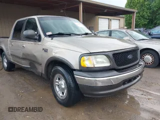 2002 Ford F-150 XLT with VIN 1FTRW07682KA22917, listed as a IAAI auction lot 42005163 with 240,792 mi miles. Bid and sale history available at carsss.com. Image 1.