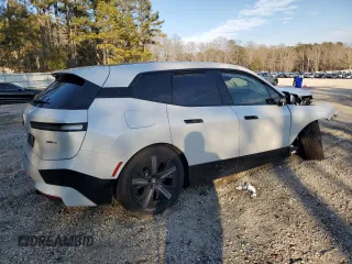 2025 BMW iX xDrive50 with VIN WB523CF0XSCS62033, listed as a Copart auction lot 42503325 with 7,294 mi miles and Salvage Title. Bid and sale history available at carsss.com. Image 3.