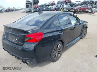 2017 Subaru WRX Premium with VIN JF1VA1E68H9829918, listed as a IAAI auction lot 41726861 with 97,263 mi miles. Bid and sale history available at carsss.com. Image 4.