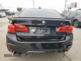 2020 BMW M5 z VIN WBSJF0C02LCE10800, wystawiony jako Copart lot #60674545 z przebiegiem Nie podano mil oraz Szkoda całkowita • Salvage title. Historia ofert i sprzedaży dostępna na DreamBid. Obrazek 6.