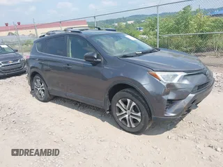 2017 Toyota RAV4 LE with VIN JTMBFREV2HJ701869, listed as a IAAI auction lot 42422409 with 98,769 mi miles and . Bid and sale history available at DreamBid. Image 1.