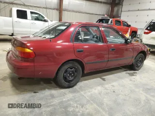 2000 Chevrolet Prizm LSi z VIN 1Y1SK5289YZ401410, wystawiony jako Copart lot #57581435 z przebiegiem Nie podano mil oraz Nie do naprawy. Historia ofert i sprzedaży dostępna na DreamBid. Obrazek 3.