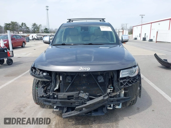 2014 Jeep Grand Cherokee Overland with VIN 1C4RJFCT6EC187098, listed as a IAAI auction lot 42077453 with 172,220 mi miles and . Bid and sale history available at DreamBid. Image 13.