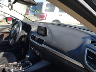 2018 Mazda 3 Touring with VIN 3MZBN1V34JM208669, listed as a IAAI auction lot 41834164 with 117,639 mi miles. Bid and sale history available at carsss.com. Image 5.