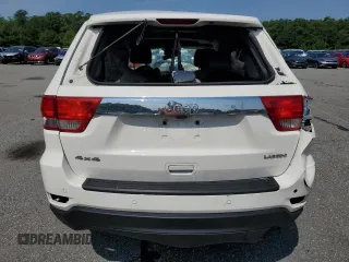 2011 Jeep Grand Cherokee Laredo with VIN 1J4RR4GG6BC657520, listed as a Copart auction lot 63558355 with 215,444 mi miles and Salvage title. Bid and sale history available at DreamBid. Image 6.