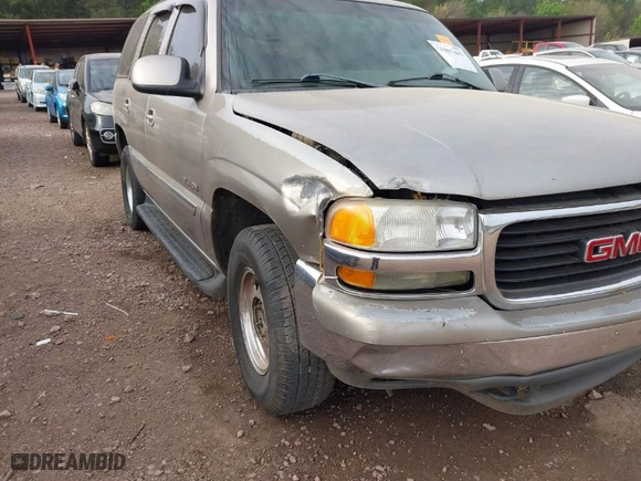 2003 GMC Yukon SLT with VIN 1GKEC13Z33R161136, listed as a IAAI auction lot 41907443 with 325,842 mi miles. Bid and sale history available at carsss.com. Image 6.