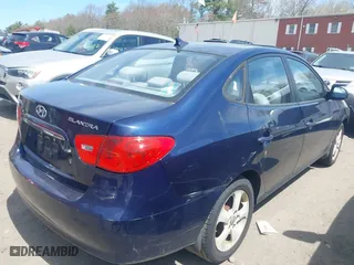 2009 Hyundai Elantra SE with VIN KMHDU46D79U818575, listed as a IAAI auction lot 42075991 with 215,096 mi miles. Bid and sale history available at carsss.com. Image 4.