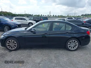 2018 BMW 3 Series 320i with VIN WBA8E1G57JNU88781, listed as a IAAI auction lot 42019246 with 56,820 mi miles. Bid and sale history available at carsss.com. Image 15.
