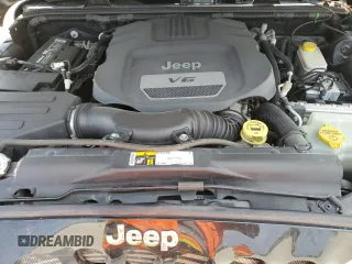 2015 Jeep Wrangler Sport with VIN 1C4AJWAG3FL723090, listed as a Copart auction lot 53325235 with 96,306 mi miles and Salvage title. Bid and sale history available at DreamBid. Image 12.