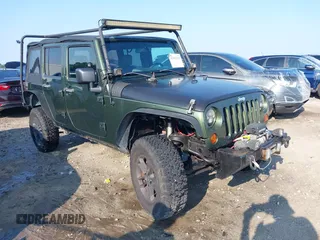 2007 Jeep Wrangler Unlimited X with VIN 1J4GA39197L115109, listed as a IAAI auction lot 42582190 with 141,080 mi miles and . Bid and sale history available at DreamBid. Image 1.