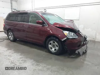 2007 Honda Odyssey EX-L with VIN 5FNRL38607B129361, listed as a IAAI auction lot 41778611 with Not Provided miles and . Bid and sale history available at carsss.com. Image 1.