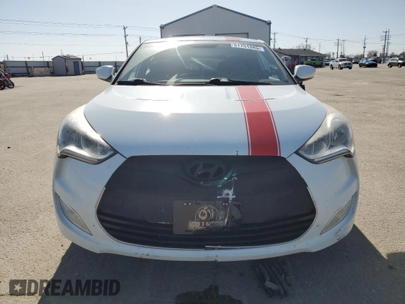2013 Hyundai Veloster w/Gray Int z VIN KMHTC6ADXDU127194, wystawiony jako Copart lot #51751345 z przebiegiem 122 221 mil mil oraz Szkoda całkowita • Salvage title. Historia ofert i sprzedaży dostępna na DreamBid. Obrazek 5.