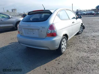 2010 Hyundai Accent GS with VIN KMHCM3AC2AU164786, listed as a IAAI auction lot 41995191 with 148,174 mi miles. Bid and sale history available at carsss.com. Image 4.