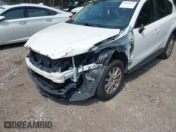 2016 Mazda CX-5 Sport with VIN JM3KE2BY6G0641051, listed as a IAAI auction lot 39959322 with 118,453 mi miles. Bid and sale history available at carsss.com. Image 6.