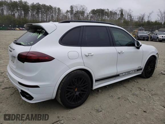 2016 Porsche Cayenne GTS с VIN WP1AD2A26GLA72543, выставлен на аукционе Copart как лот 49081025 с пробегом 160 019 миль миль и Списание • Salvage title. История ставок и продаж доступна на DreamBid. Изображение 3.