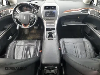 2015 Lincoln MKZ с VIN 3LN6L2JK6FR616660, выставлен на аукционе Copart как лот 66220555 с пробегом 47 377 миль миль и Списание • Salvage title. История ставок и продаж доступна на DreamBid. Изображение 8.