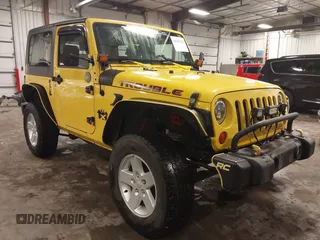 2008 Jeep Wrangler X with VIN 1J8FA24108L597093, listed as a IAAI auction lot 42401363 with 215,424 mi miles and . Bid and sale history available at DreamBid. Image 1.