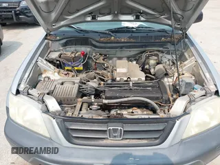 2001 Honda CR-V LX z VIN JHLRD18471C026705, wystawiony jako IAAI lot #42409542 z przebiegiem 201 015 mil mil oraz . Historia ofert i sprzedaży dostępna na DreamBid. Obrazek 10.
