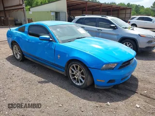 2010 Ford Mustang V6 with VIN 1ZVBP8AN0A5146767, listed as a IAAI auction lot 42121964 with 139,009 mi miles. Bid and sale history available at carsss.com. Image 1.