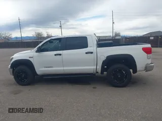 2012 Toyota Tundra 4WD Truck with VIN 5TFDW5F10CX223471, listed as a IAAI auction lot 41839687 with 249,246 mi miles. Bid and sale history available at carsss.com. Image 14.