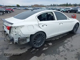 2014 Infiniti Q50 Premium z VIN JN1BV7AP8EM671403, wystawiony jako IAAI lot #41837716 z przebiegiem 115 058 mil mil oraz . Historia ofert i sprzedaży dostępna na DreamBid. Obrazek 4.