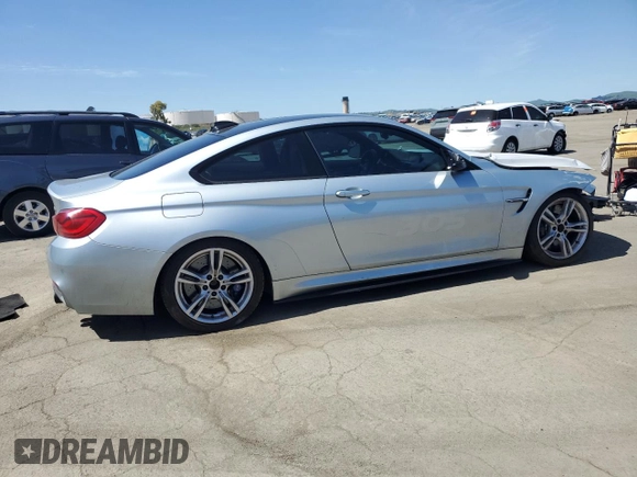 2015 BMW M4 with VIN WBS3R9C52FK334020, listed as a Copart auction lot 51867985 with 95,369 mi miles and Salvage title. Bid and sale history available at DreamBid. Image 3.