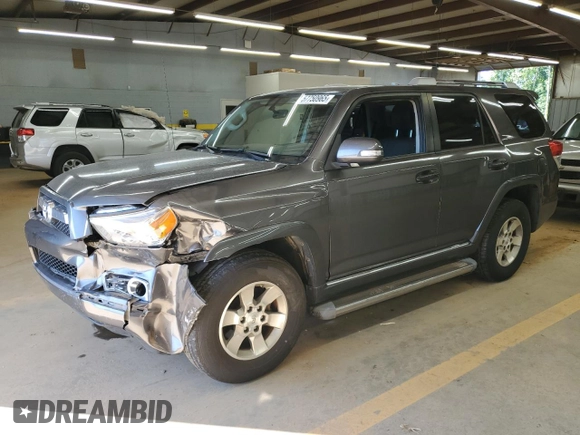 2011 Toyota 4Runner Trail z VIN JTEBU5JR6B5039779, wystawiony jako Copart lot #57750965 z przebiegiem 199 116 mil mil oraz Szkoda całkowita • Salvage title. Historia ofert i sprzedaży dostępna na DreamBid. Obrazek 1.