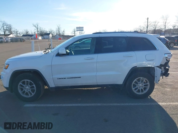 2019 Jeep Grand Cherokee Laredo E with VIN 1C4RJFAG7KC694674, listed as a IAAI auction lot 41591678 with 61,144 mi miles. Bid and sale history available at carsss.com. Image 14.