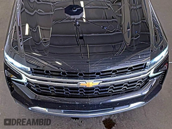 2022 Chevrolet Tahoe LS z VIN 1GNSKMKD7NR129745, wystawiony jako IAAI lot #42566236 z przebiegiem 95 126 mil mil oraz . Historia ofert i sprzedaży dostępna na DreamBid. Obrazek 29.
