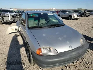 2001 Suzuki Swift GA z VIN 2S2AB21H516602339, wystawiony jako Copart lot #50135584 z przebiegiem 142 476 mil mil oraz Szkody całkowita. Historia ofert i sprzedaży dostępna na DreamBid. Obrazek 10.