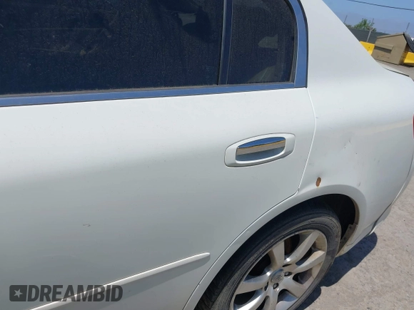 2005 Infiniti G35 with VIN JNKCV51F55M300727, listed as a IAAI auction lot 42196422 with Not Provided miles and . Bid and sale history available at DreamBid. Image 12.