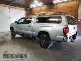 2021 Toyota Tacoma 4WD SR5 with VIN 3TMDZ5BN3MM103509, listed as a Copart auction lot 48461875 with 54,566 mi miles and Salvage Title. Bid and sale history available at carsss.com. Image 2.