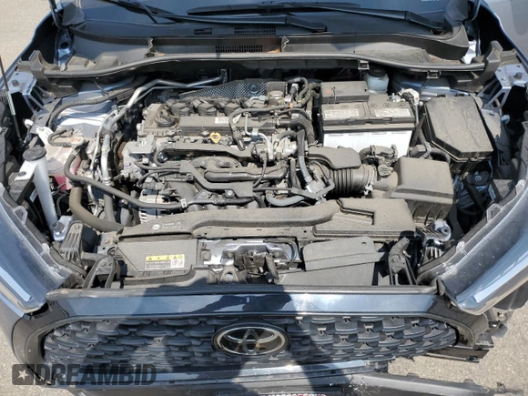 2023 Toyota Corolla Cross LE with VIN 7MUCAABG4PV054828, listed as a Copart auction lot 59466855 with 23,884 mi miles and Salvage title. Bid and sale history available at DreamBid. Image 12.