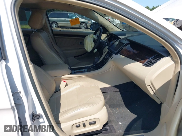 2014 Ford Taurus Limited with VIN 1FAHP2F8XEG181491, listed as a IAAI auction lot 40277144 with 107,374 mi miles. Bid and sale history available at carsss.com. Image 5.