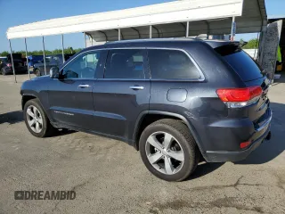 2014 Jeep Grand Cherokee Limited with VIN 1C4RJEBT0EC141553, listed as a Copart auction lot 50835405 with 61,585 mi miles and Salvage Title. Bid and sale history available at DreamBid. Image 2.
