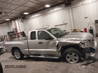 2010 Dodge Dakota with VIN 1D7CW3BP7AS103645, listed as a IAAI auction lot 41514841 with 158,125 mi miles and . Bid and sale history available at DreamBid. Image 14.