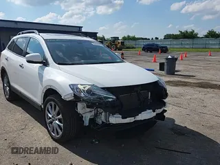 2014 Mazda CX-9 Grand Touring with VIN JM3TB3DA3E0446329, listed as a Copart auction lot 64068025 with 90,423 mi miles and Clean title. Bid and sale history available at DreamBid. Image 15.