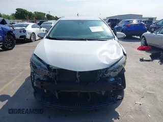 2019 Toyota Corolla L z VIN 5YFBURHEXKP885270, wystawiony jako IAAI lot #42291425 z przebiegiem 82 304 mil mil oraz . Historia ofert i sprzedaży dostępna na DreamBid. Obrazek 13.