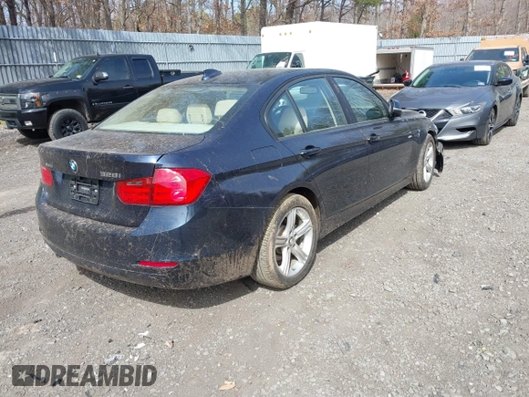 2013 BMW 3 Series 328i xDrive with VIN WBA3B5G59DNS01455, listed as a IAAI auction lot 41788947 with 127,677 mi miles. Bid and sale history available at carsss.com. Image 4.