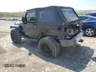 2011 Jeep Wrangler Sahara with VIN 1J4AA5D14BL542912, listed as a Copart auction lot 65158784 with 122,795 mi miles and Salvage Title. Bid and sale history available at DreamBid. Image 2.