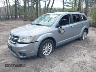 2015 Dodge Journey SXT with VIN 3C4PDCBG5FT696882, listed as a IAAI auction lot 41848362 with 175,039 mi miles and . Bid and sale history available at DreamBid. Image 17.