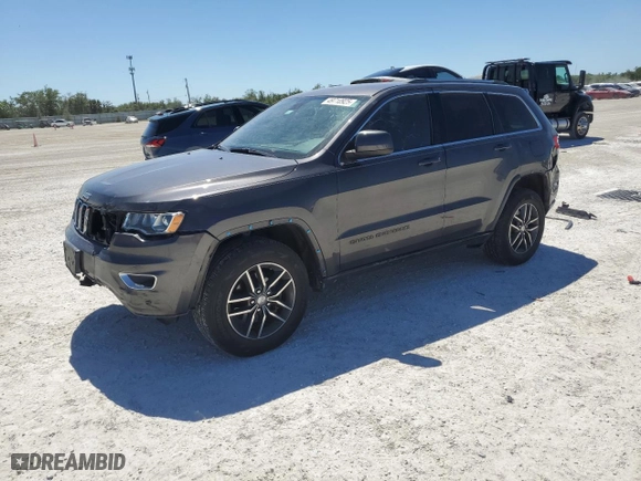 2018 Jeep Grand Cherokee Laredo E with VIN 1C4RJFAG9JC444089, listed as a Copart auction lot 49710925 with 127,707 mi miles and Salvage Title. Bid and sale history available at carsss.com. Image 1.