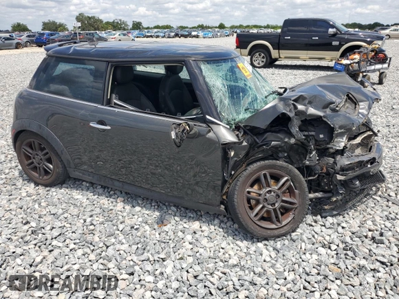 2011 MINI Hardtop S with VIN WMWSV3C55BTY20530, listed as a Copart auction lot 56016985 with Not Provided miles and Salvage Title. Bid and sale history available at DreamBid. Image 4.