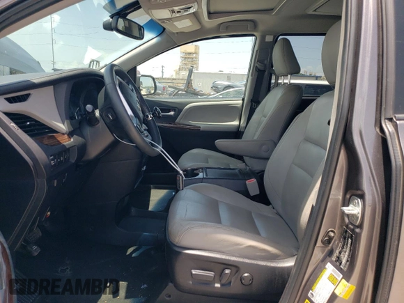 2015 Toyota Sienna Limited with VIN 5TDDK3DC2FS123483, listed as a Copart auction lot 61663545 with 88,390 mi miles and Salvage title. Bid and sale history available at DreamBid. Image 7.