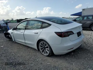 2023 Tesla Model 3 z VIN 5YJ3E1EAXPF422956, wystawiony jako Copart lot #52500285 z przebiegiem 24 082 mil mil oraz Nie do naprawy • Non repairable. Historia ofert i sprzedaży dostępna na DreamBid. Obrazek 2.