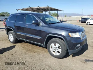 2012 Jeep Grand Cherokee Laredo with VIN 1C4RJEAG1CC334201, listed as a Copart auction lot 83696774 with 208,639 mi miles and Clean Title. Bid and sale history available at carsss.com. Image 4.
